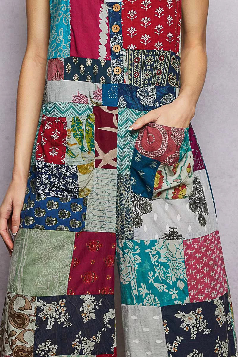 Sage patchwork wide leg jumpsuit pocket and panel detail