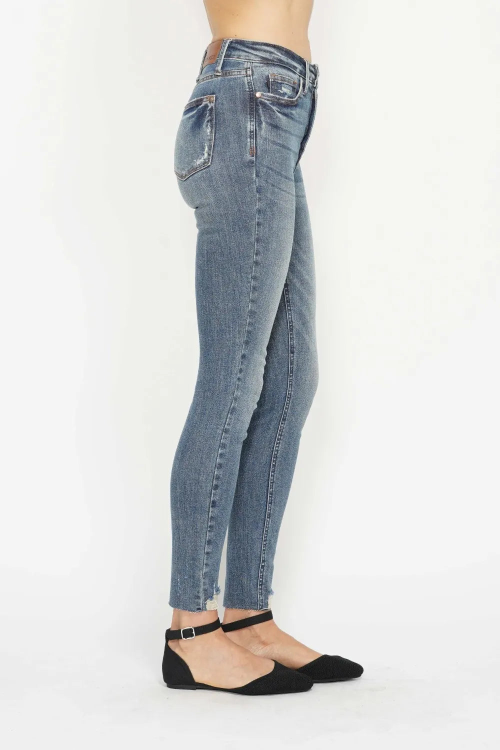 Judy Blue Tummy Control Vintage Wash Hem Distressed Skinny Jeans on model