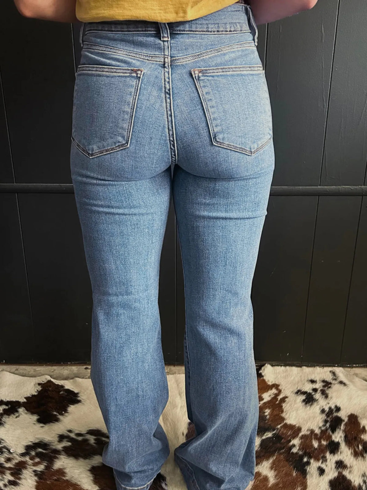 Flare jeans showing vertical front seam detail