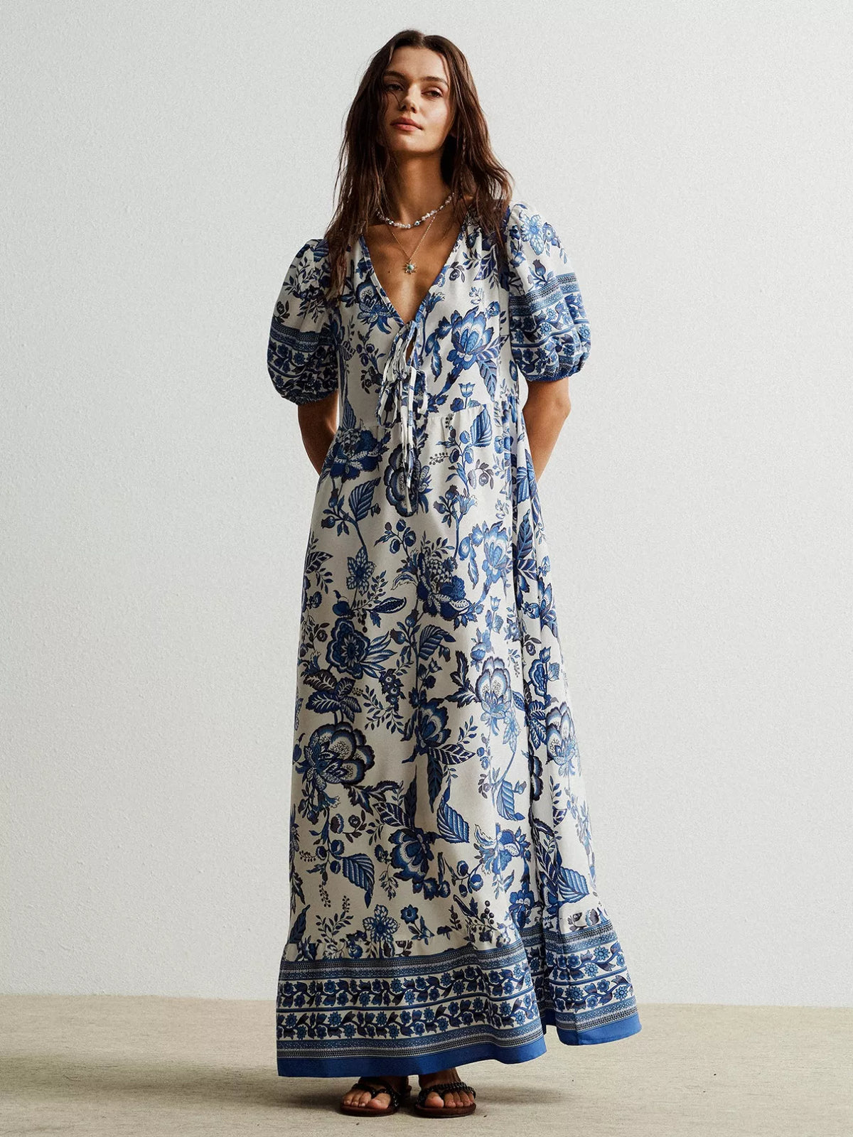 floral tie neck puff sleeve maxi dress in navy full length view