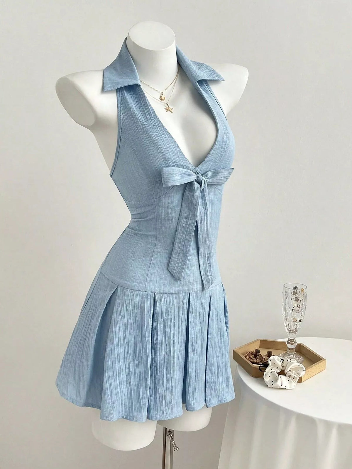 Light blue halter neck mini dress side view