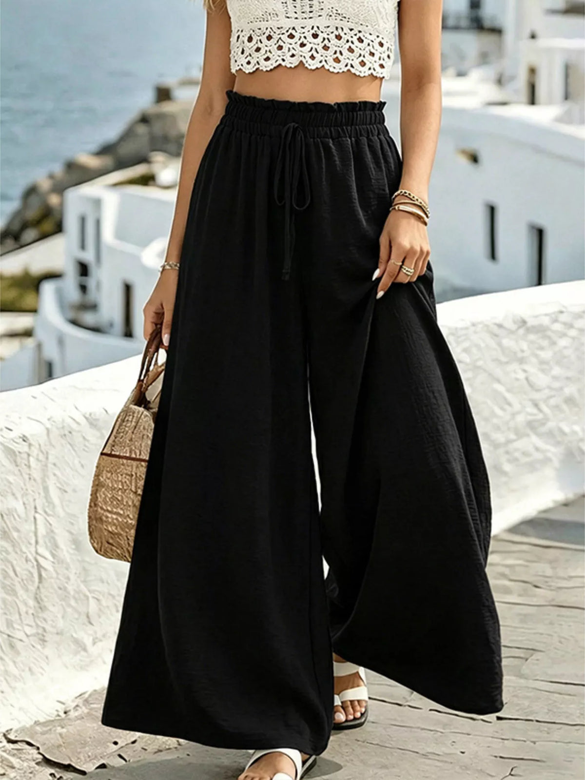 Wide leg pants laid flat showing straight leg cut