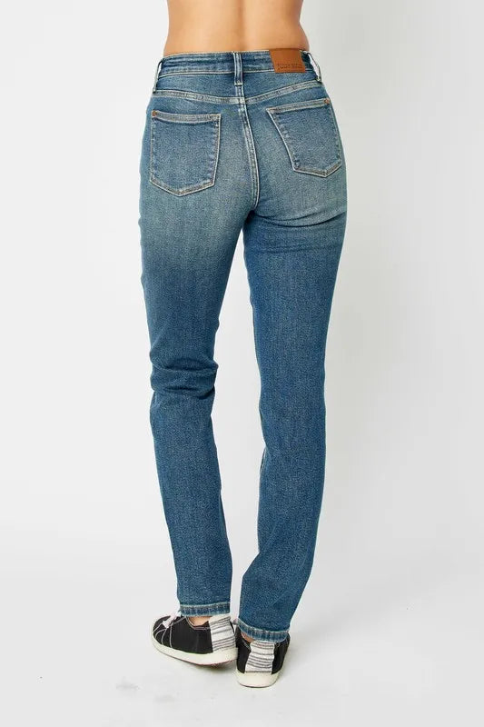 High waist skinny jeans styled with a tucked in top