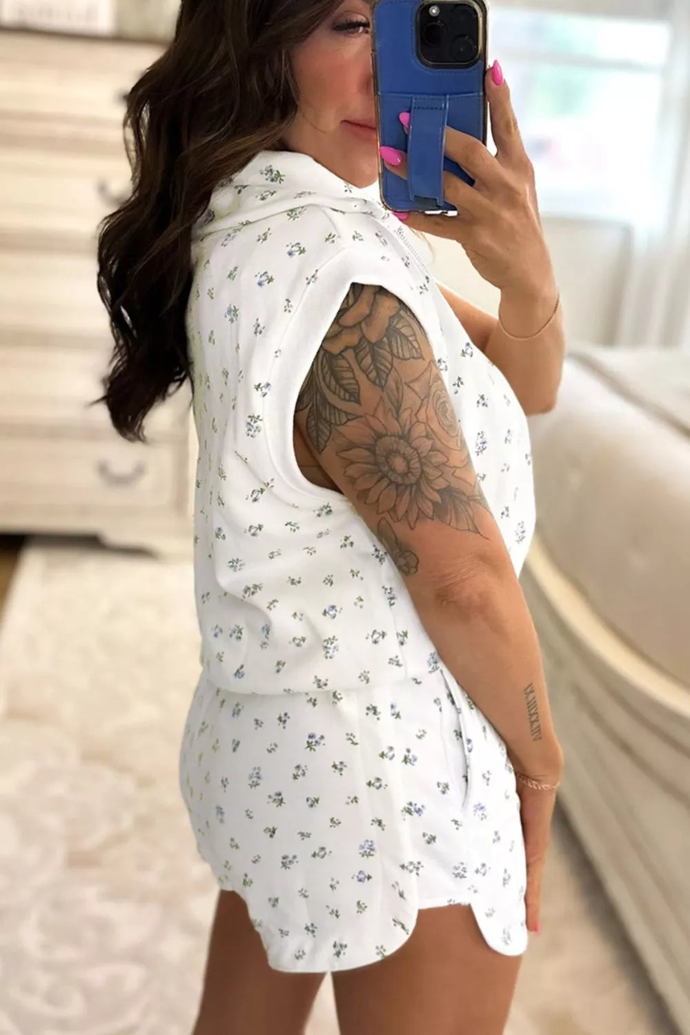 Floral half zip top detail close up