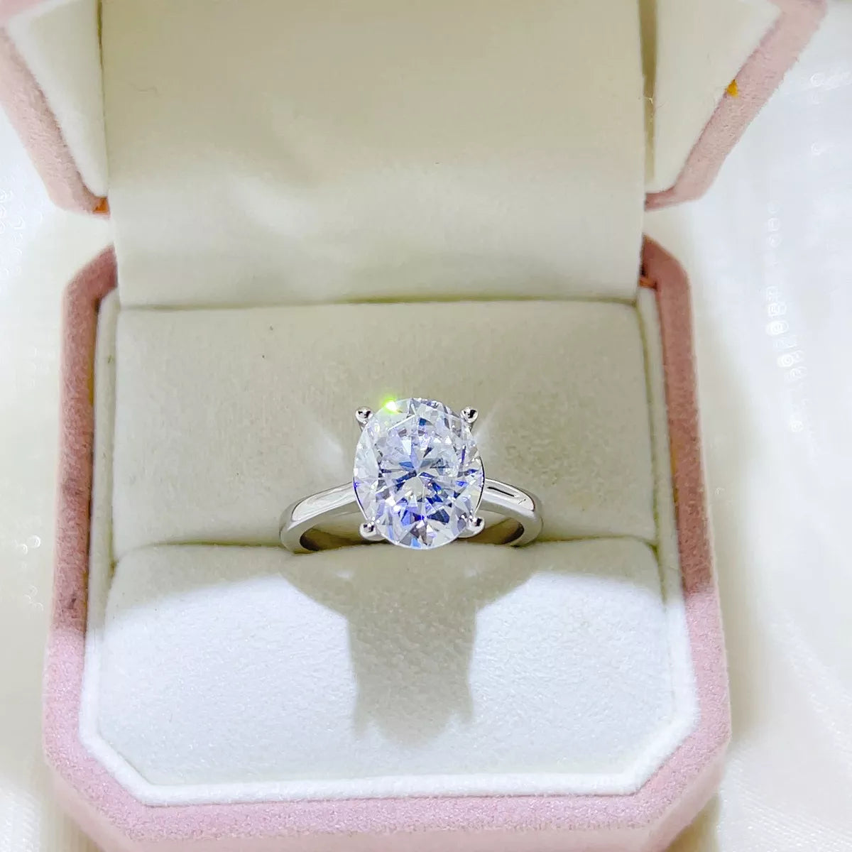 Side profile of sterling silver moissanite ring setting