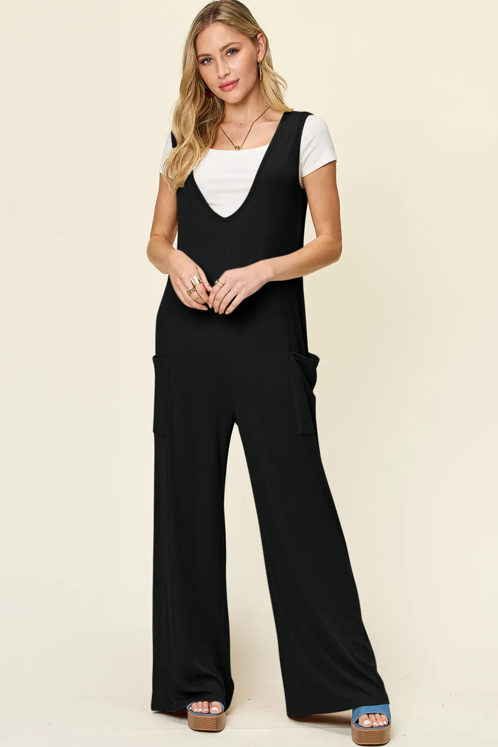 Sleeveless wide leg jumpsuit with pockets front view