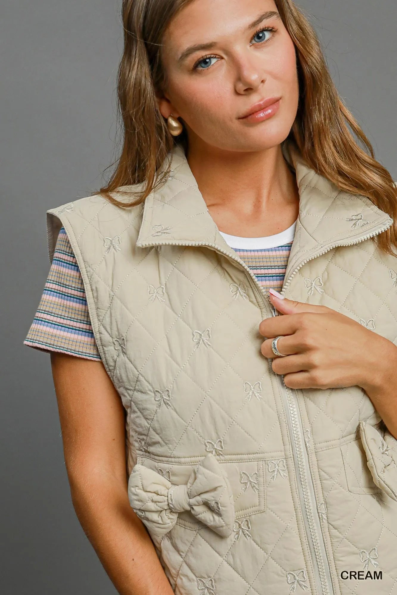 Umgee Sleeveless Quilted Vest with Bow Details - Fashorio