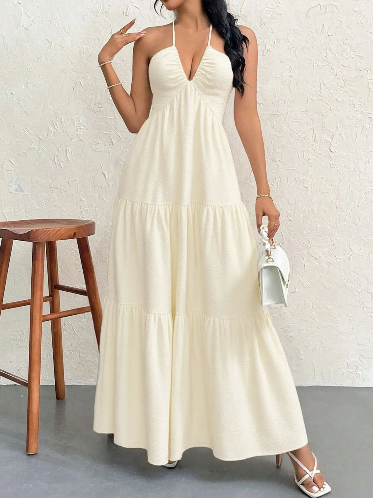 halter neck tiered backless maxi dress styled look