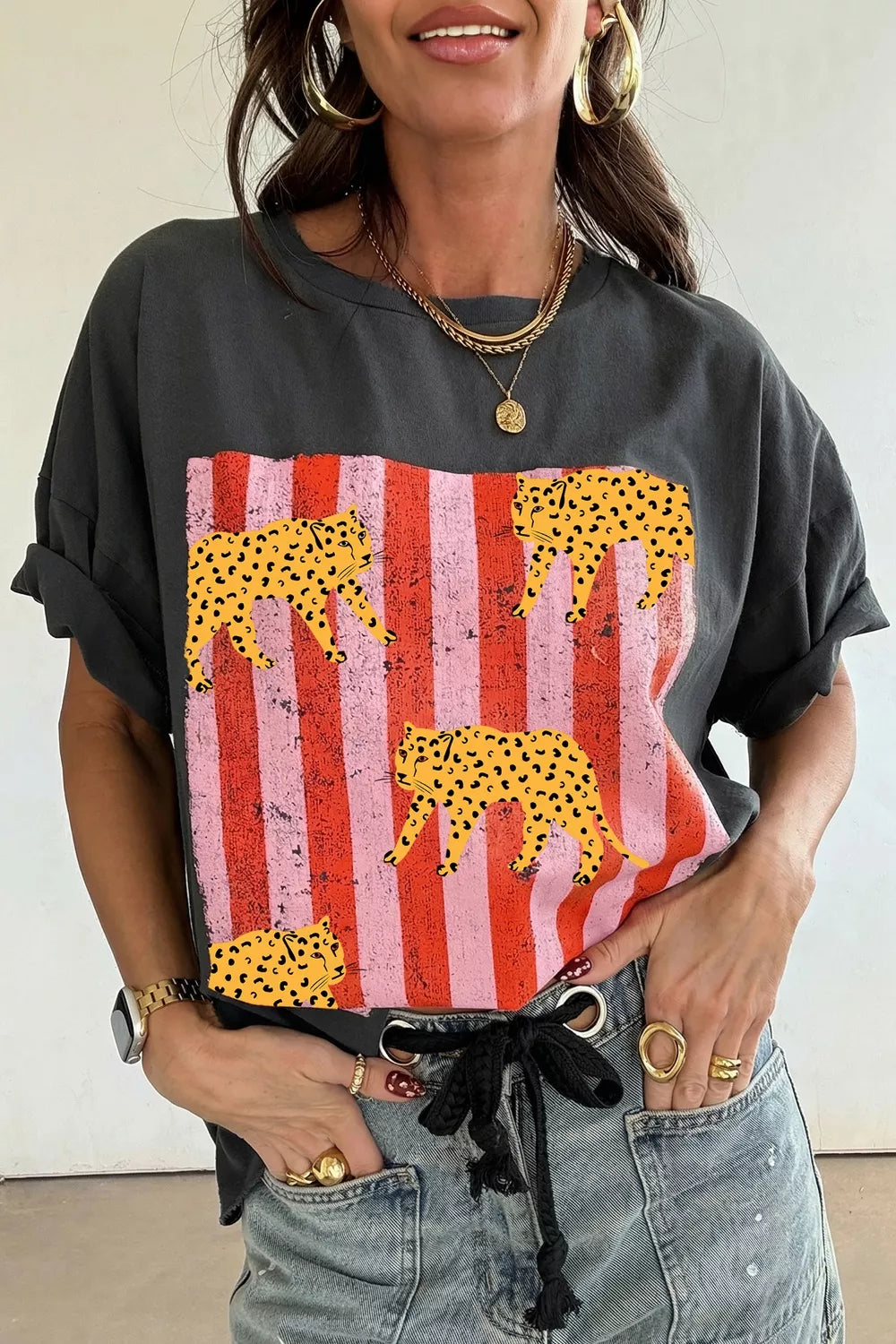 Dark gray cheetah and stripe print retro graphic tee front view