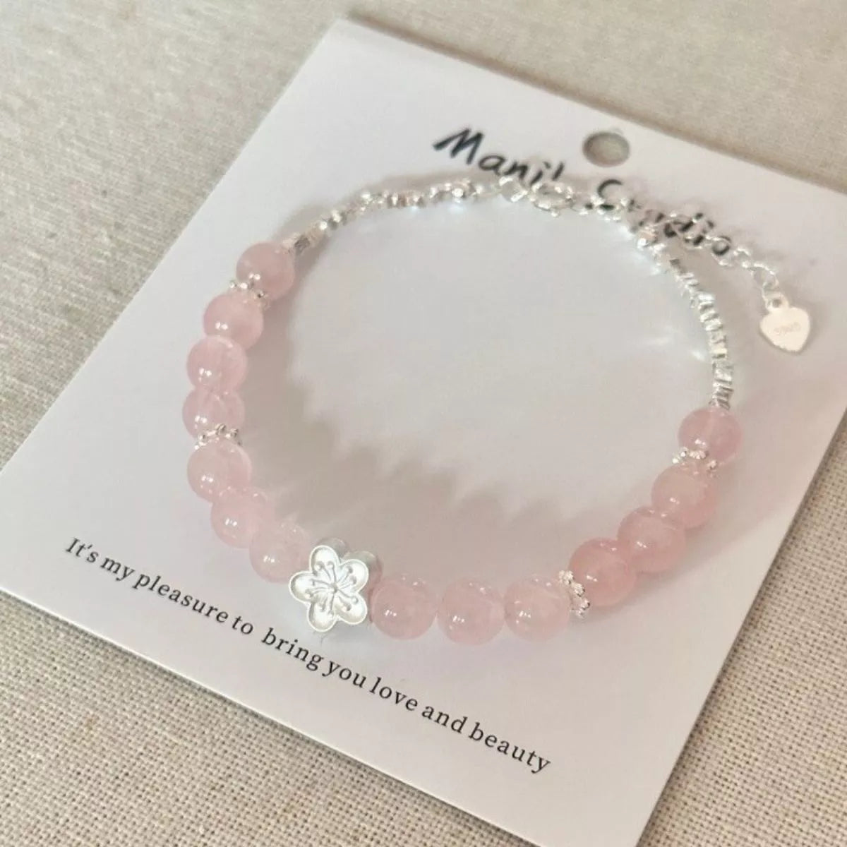 Sterling silver flower bracelet flat lay