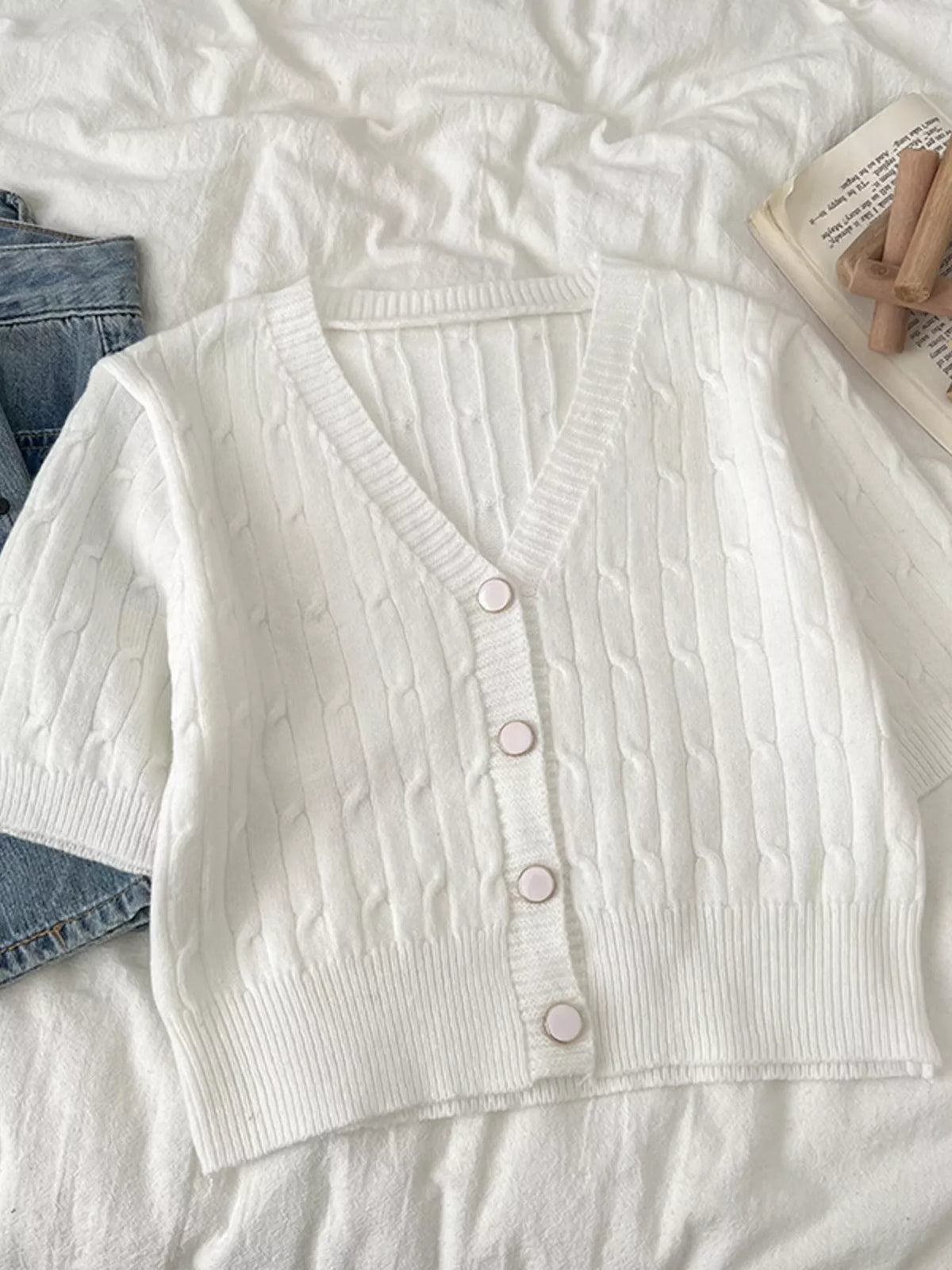 Texture knit cardigan hem detail