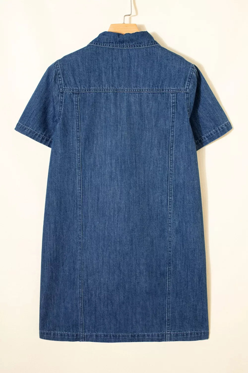 Dark blue zip up collared denim mini dress detail of the fabric
