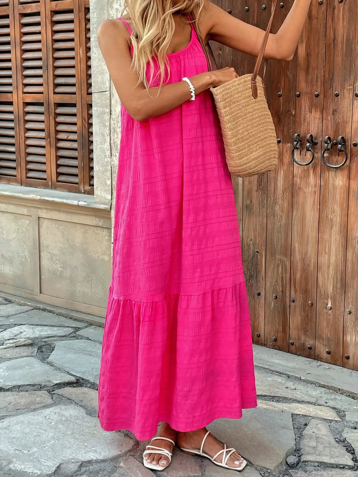 Ruffled tier detail on pink cami dress