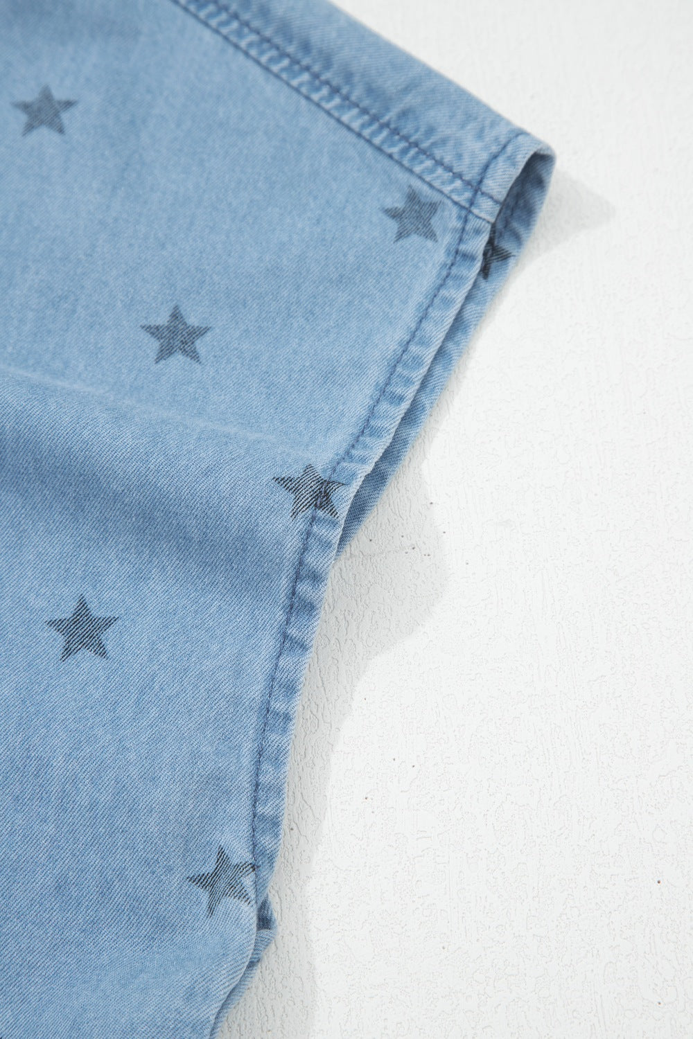 Short sleeve denim shirt flat lay view