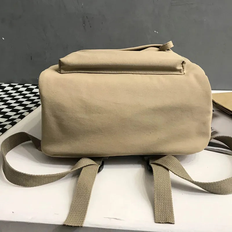 Cotton zip top backpack side profile