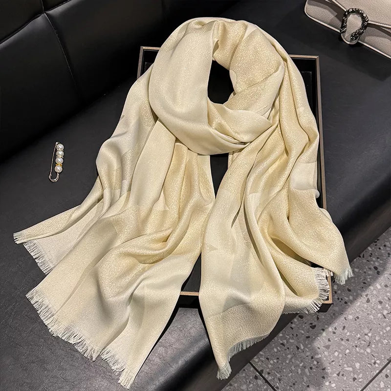 Airy scarf with modern frayed raw hem edges