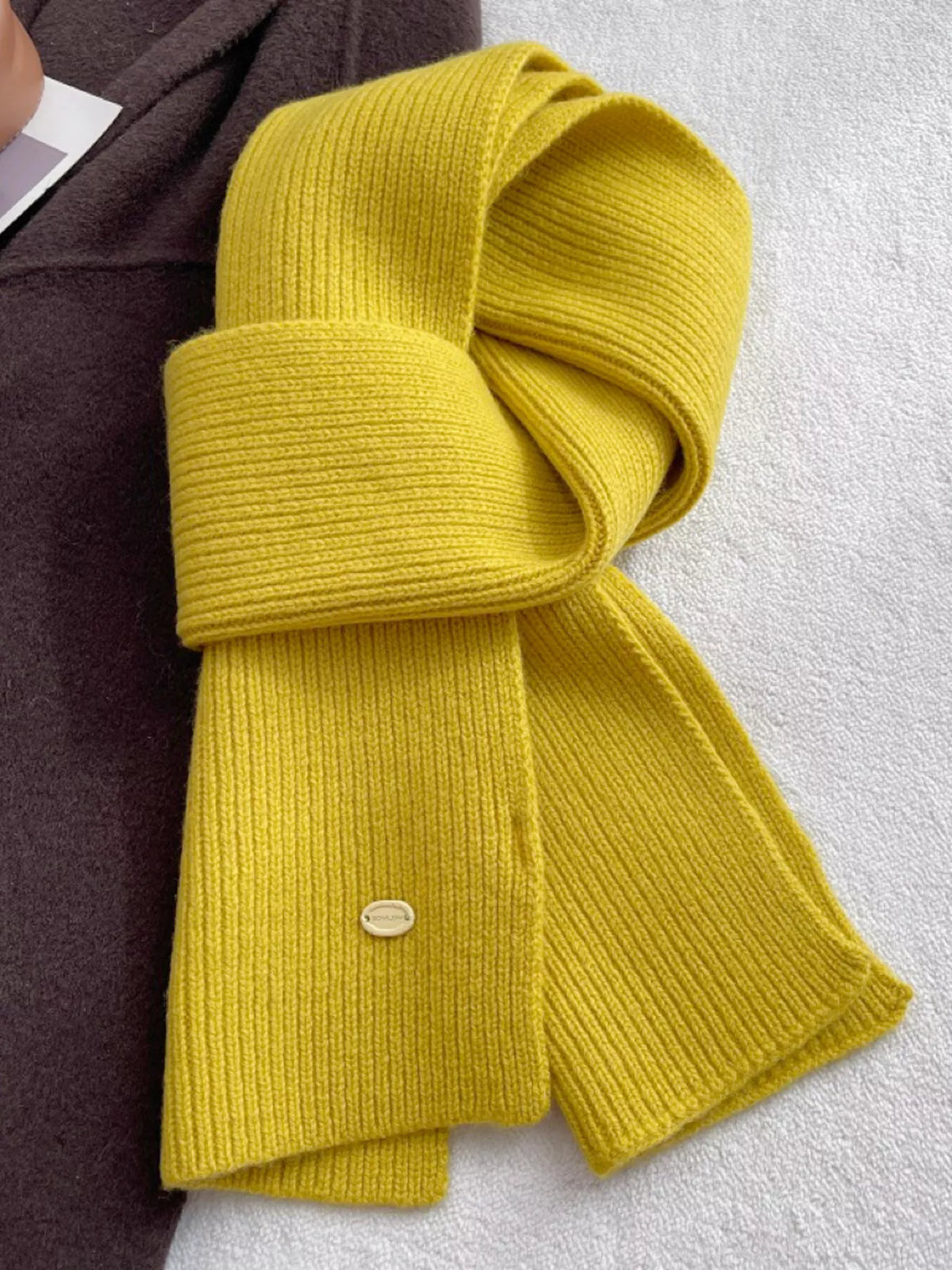 Light green wool scarf shown in full length