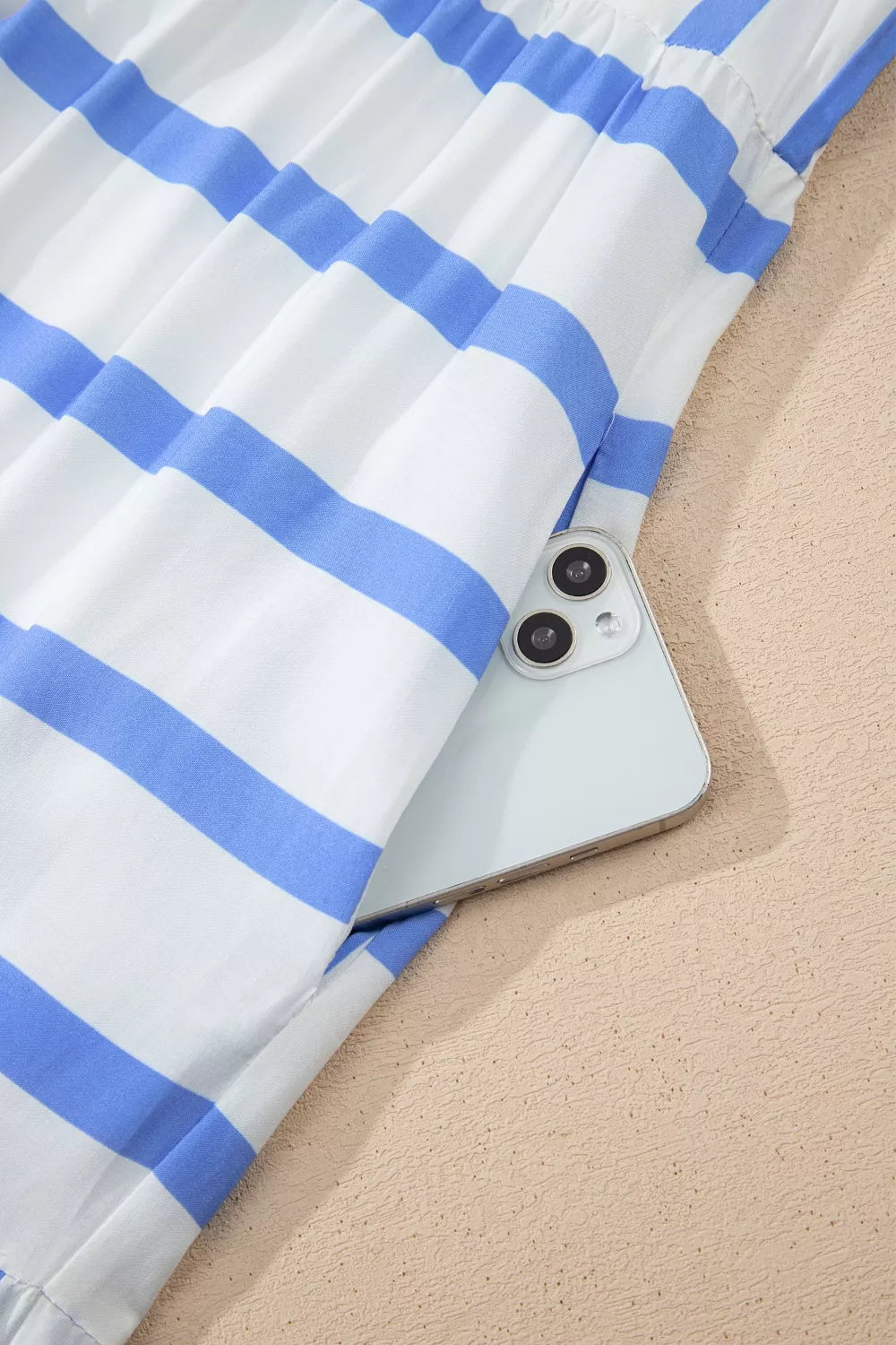 Light blue striped ricrac trim maxi dress fabric close up