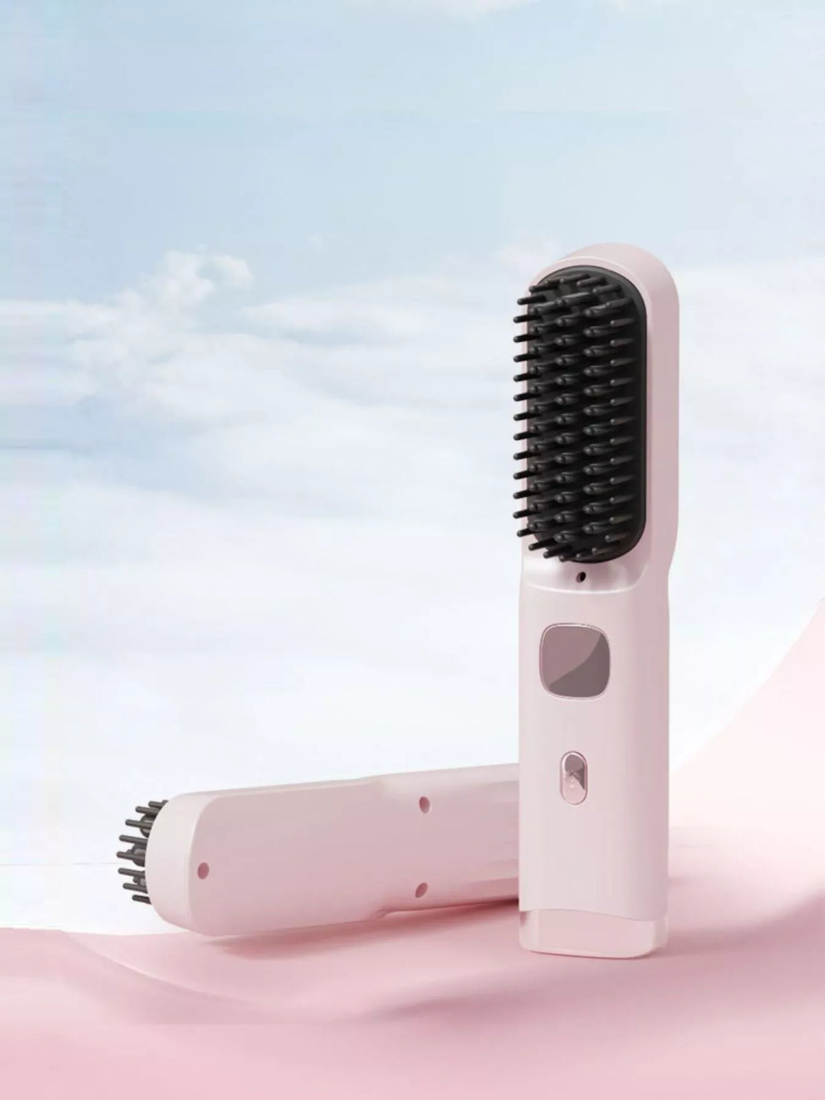 Pink portable heated straightening comb