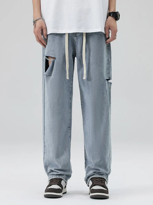 Men's Full Size Distressed Relaxed Fit Jeans with Ripped Details Plus Size Light Blue - Fashorio