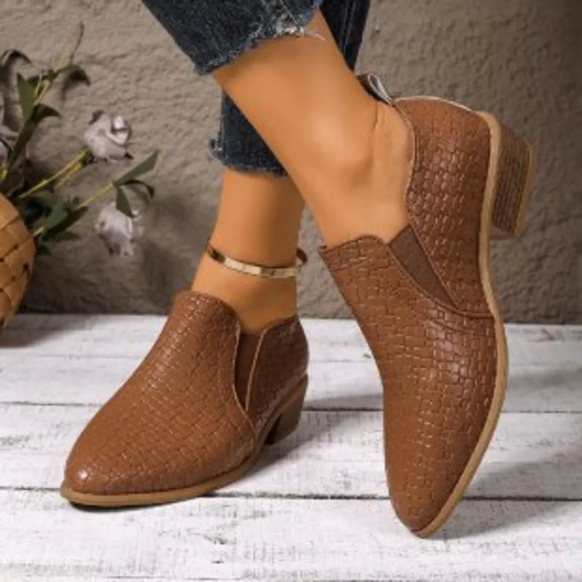 Black point toe block heels ankle boots styled with denim