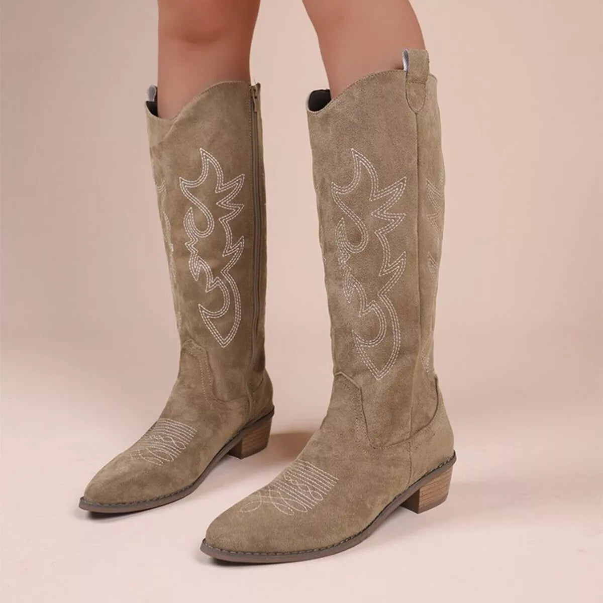 Point toe block heel suede boots side profile