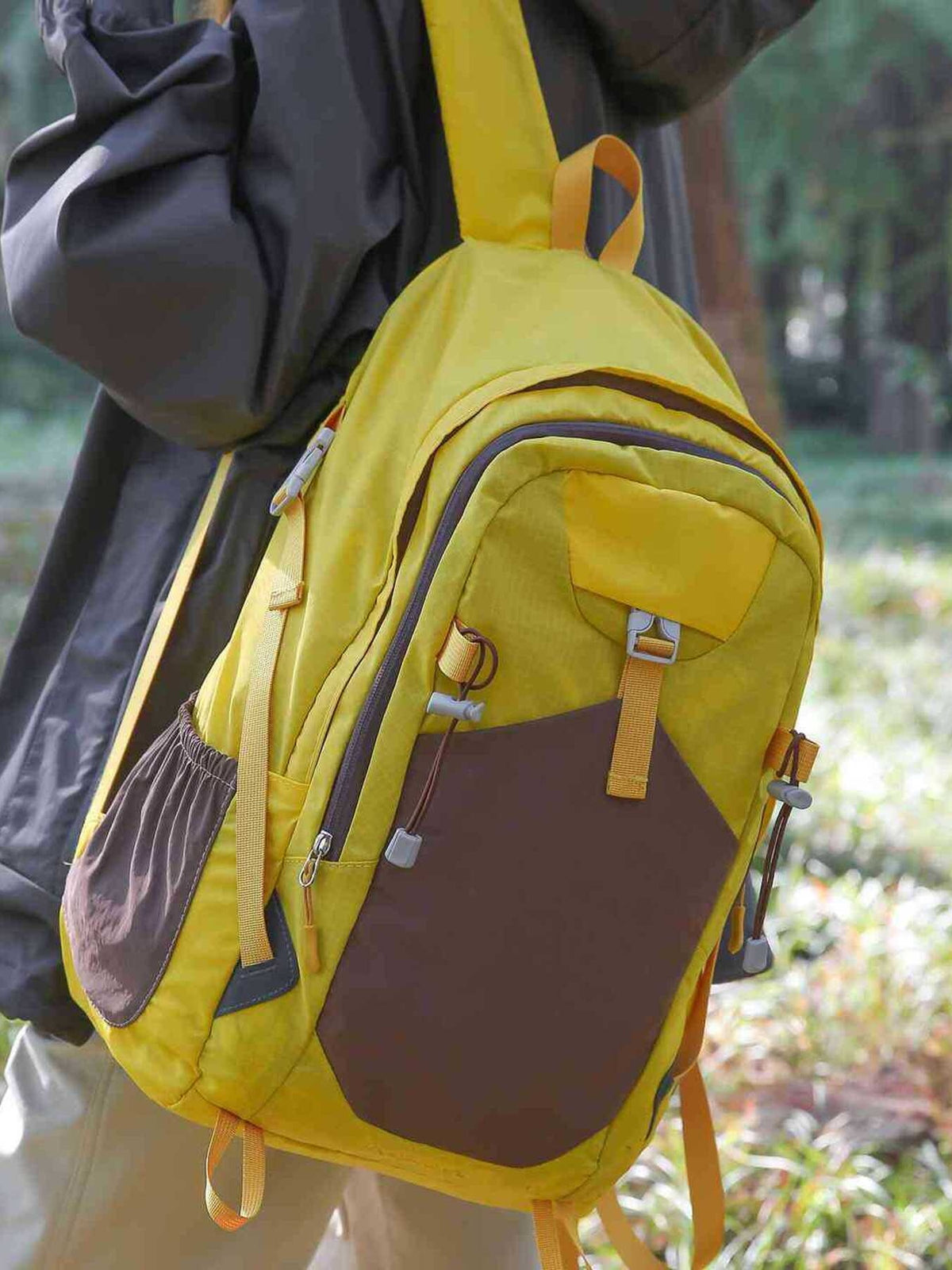 Yellow color block nylon backpack side profile
