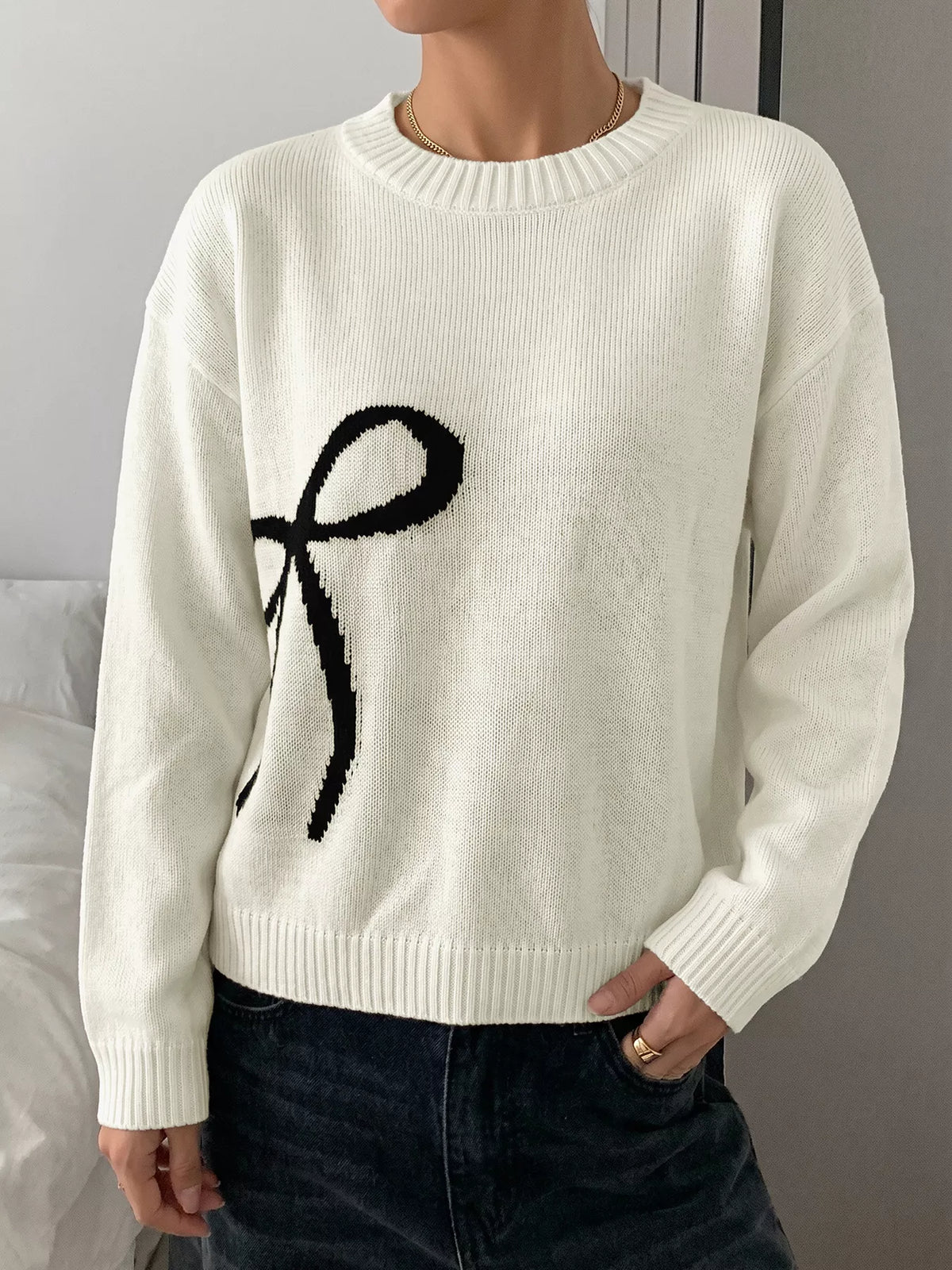 Long sleeve bow graphic sweater side view