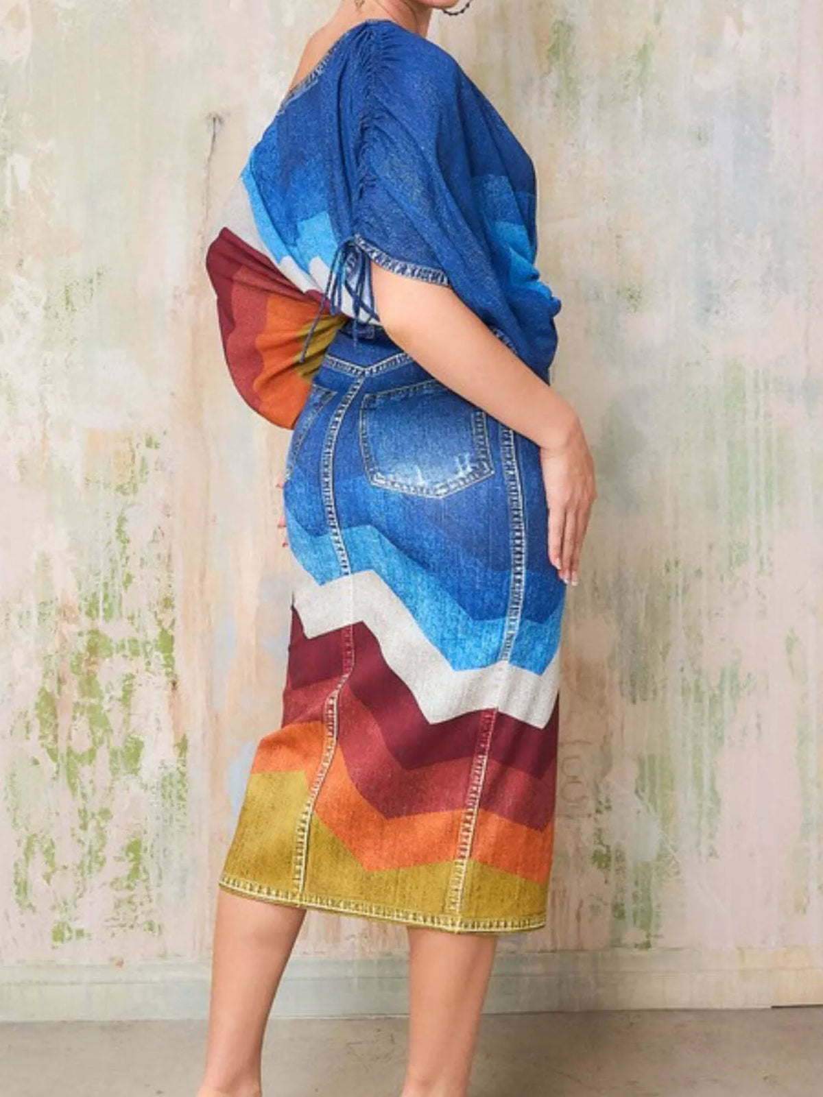 Blue one shoulder top and side slit skirt set side view