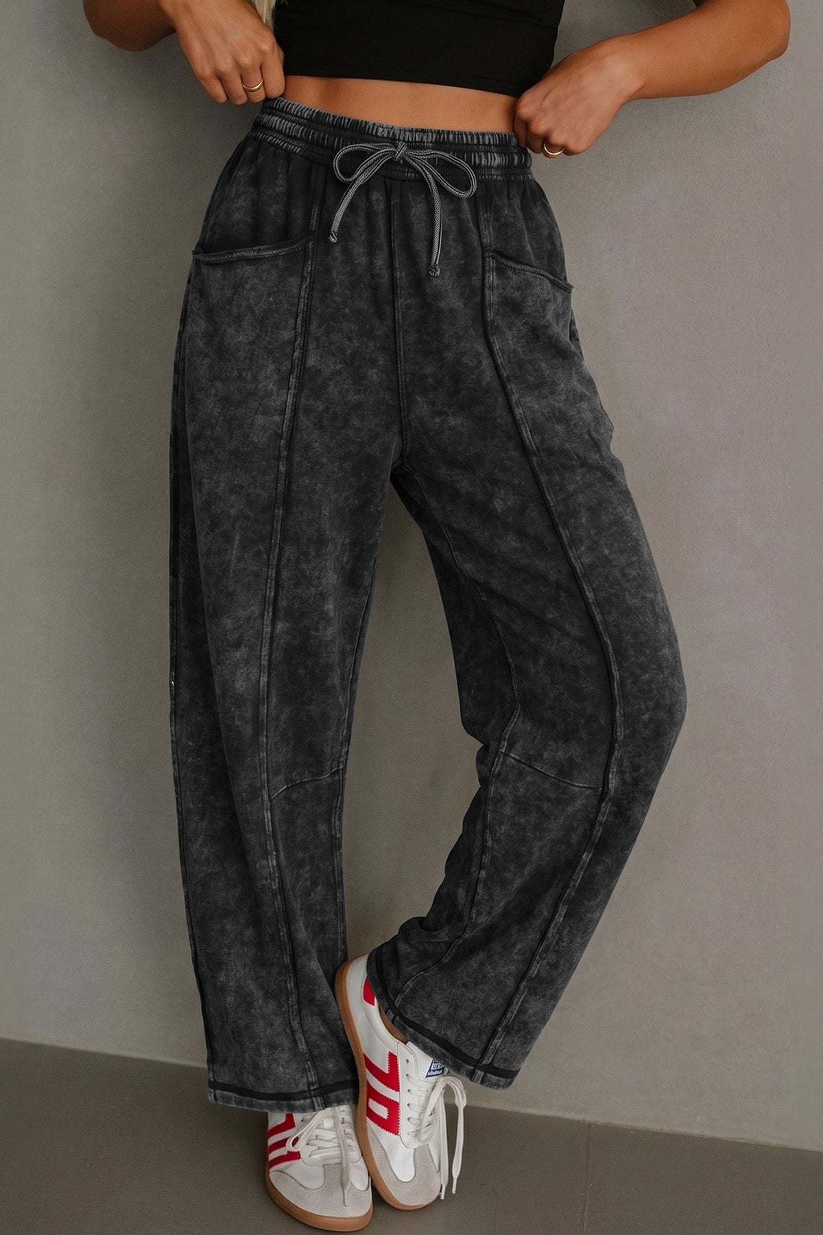 Black mineral wash elastic waist barrel pants front view