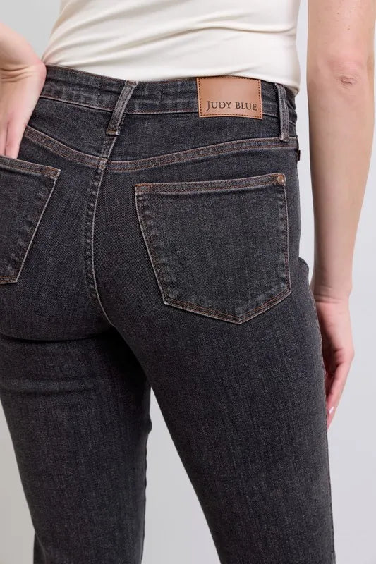 Judy Blue black tummy control jeans angled view