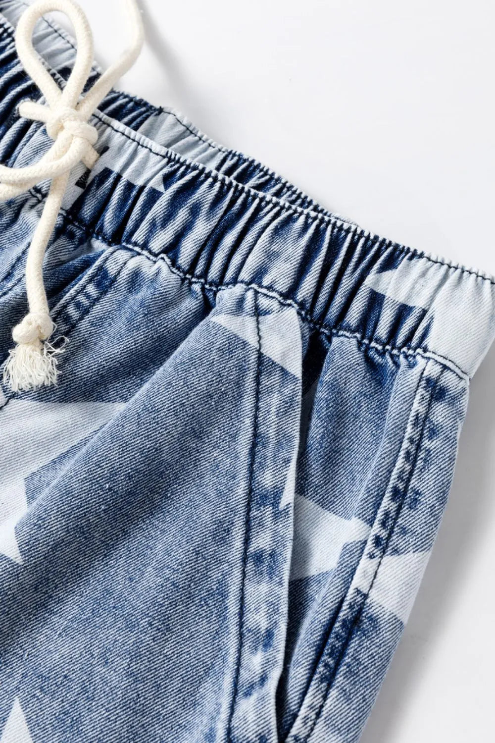 Back view of high waist star print wide leg jeans