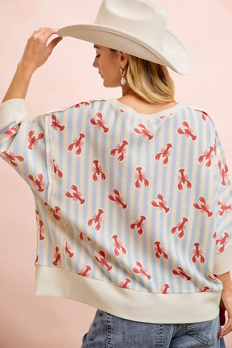 Light blue and red BiBi lobster stripe waffle knit top on model
