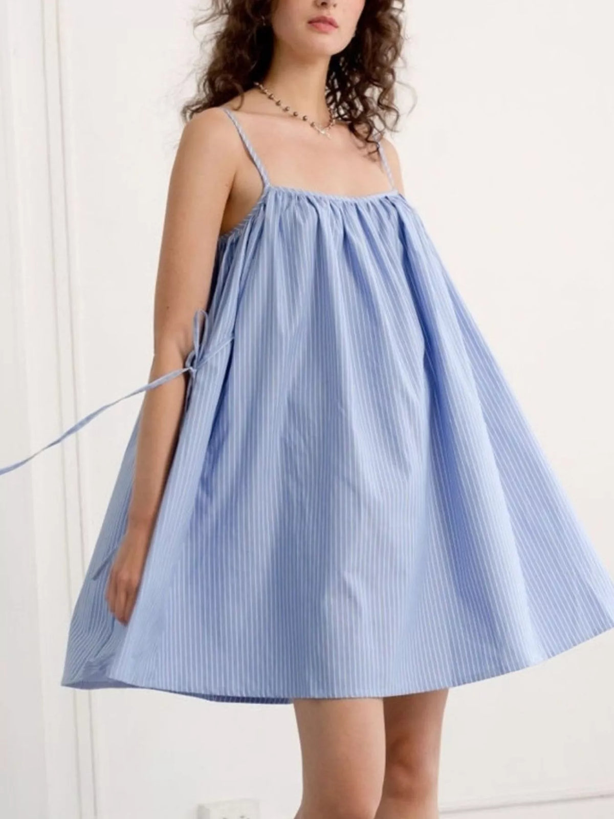 Side view of the polka dot mini dress