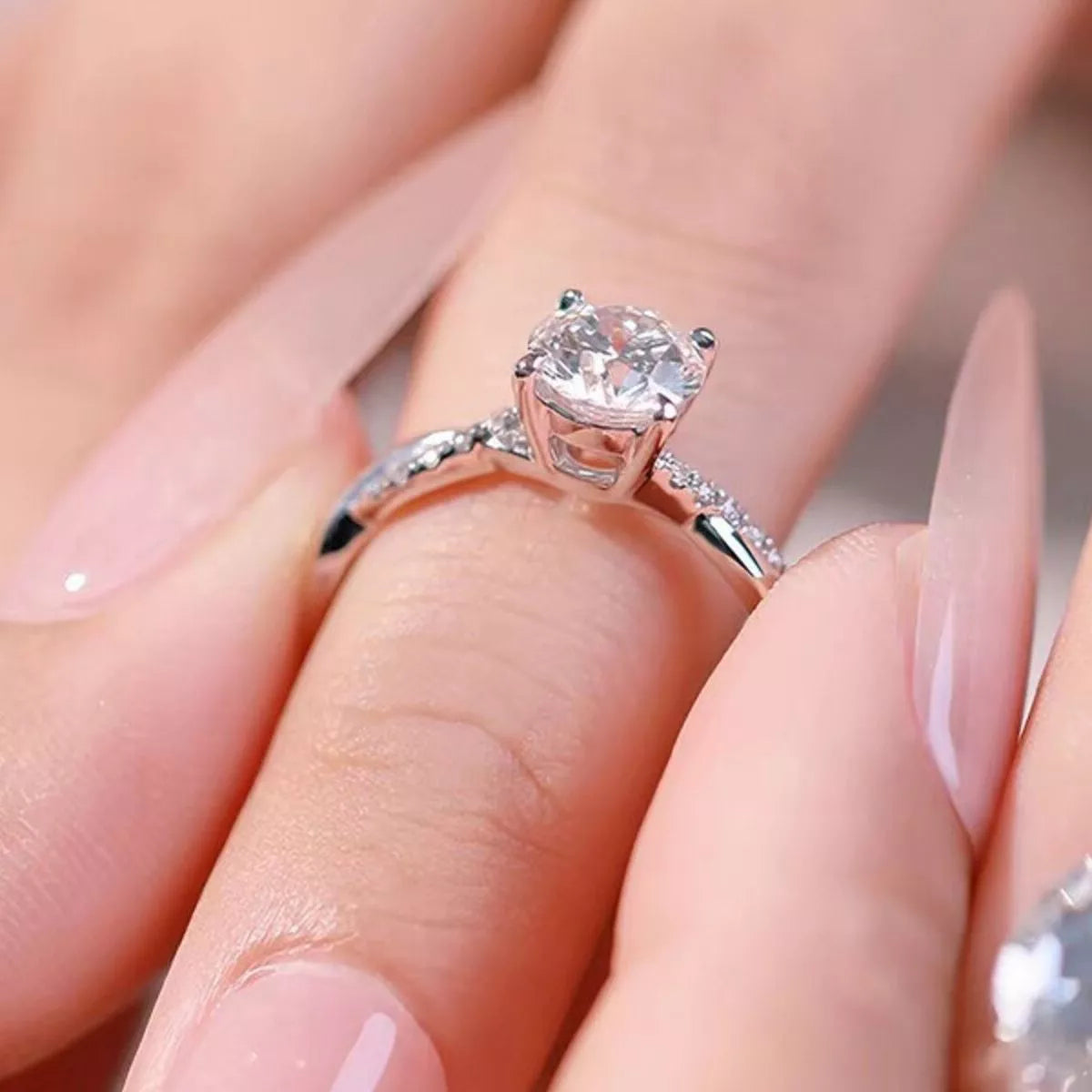 The 1 carat moissanite ring shown on the hand