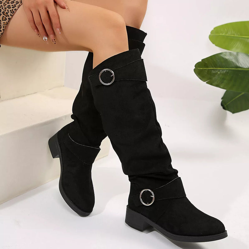 Black buckle accent slouch boots side profile view