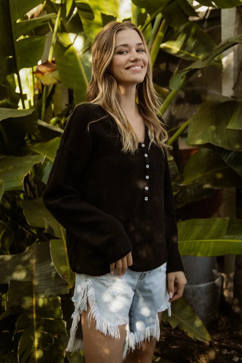 V Neck Button Detail Sweater Top in Black on model