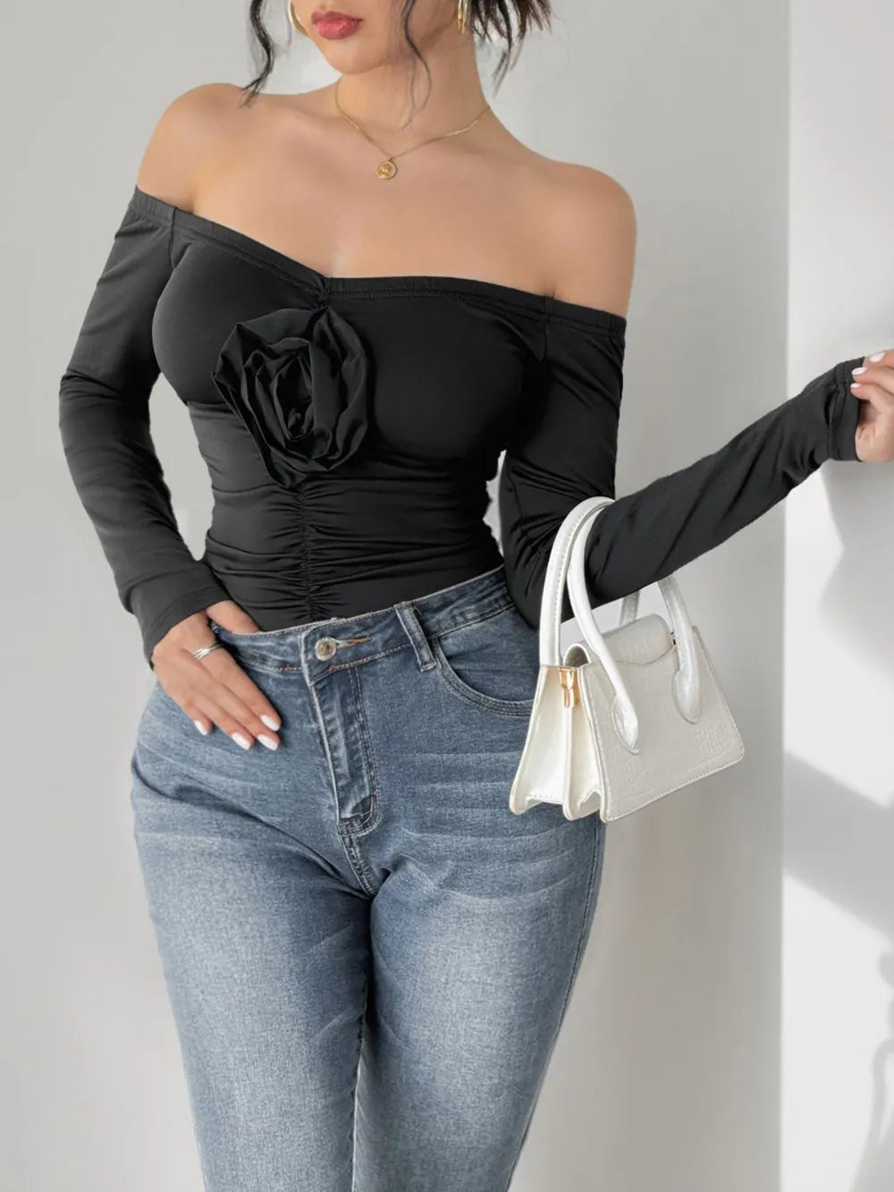 Perfee Ruched Flower Off-Shoulder Long Sleeve Bodysuit Black - Fashorio