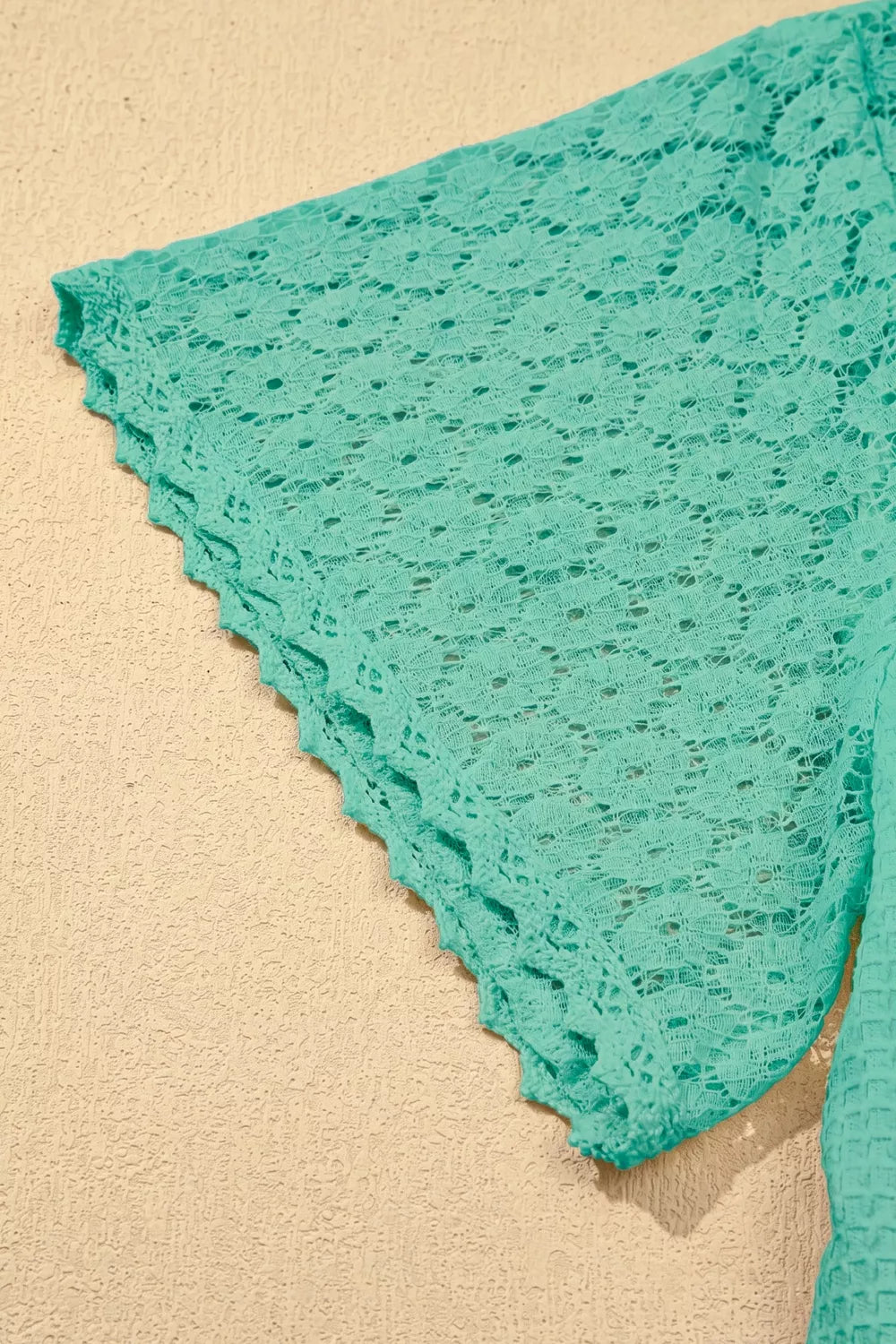 Turquoise waffle knit v neck top with lace trim front view