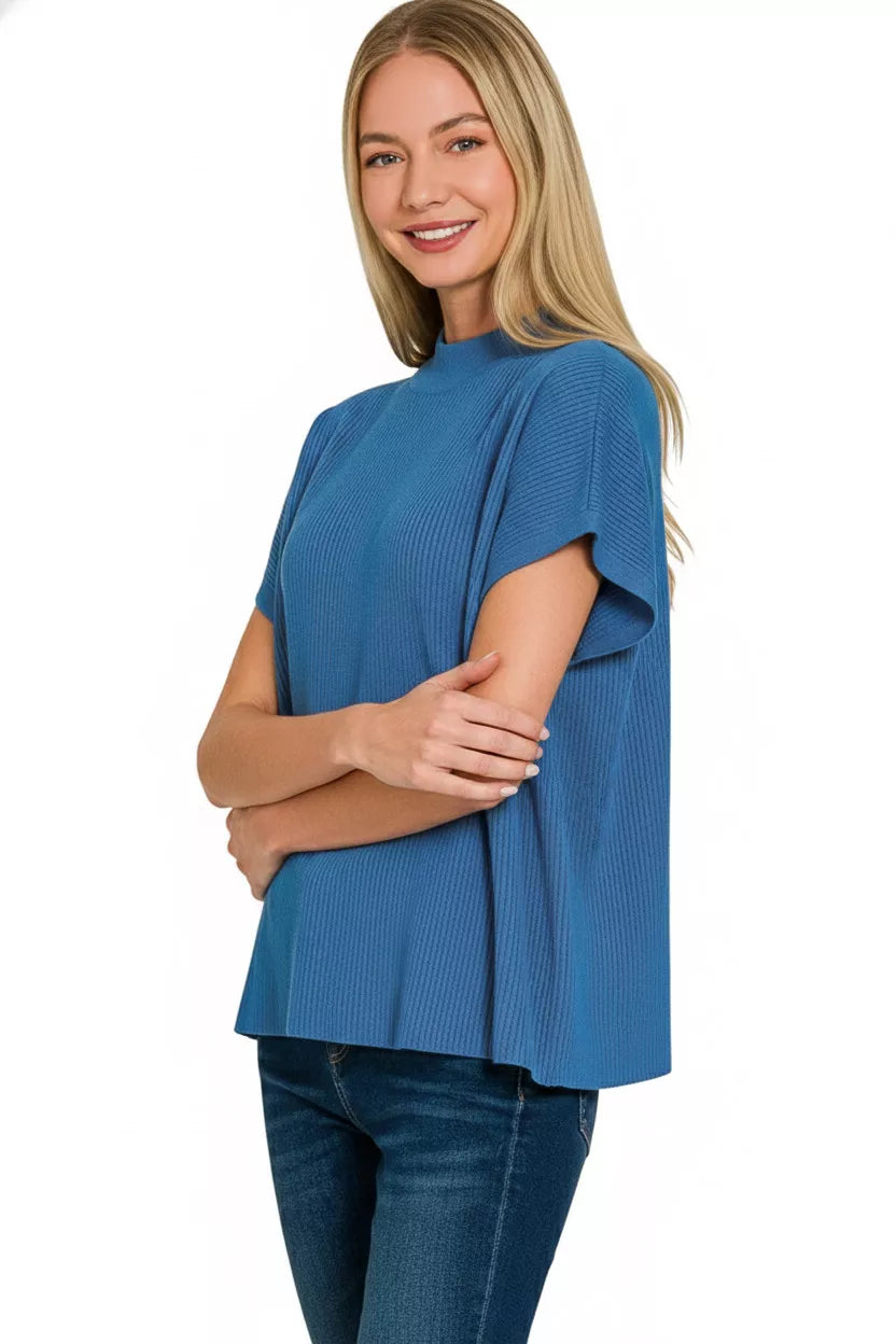 Side view of blue short sleeve knit sweater