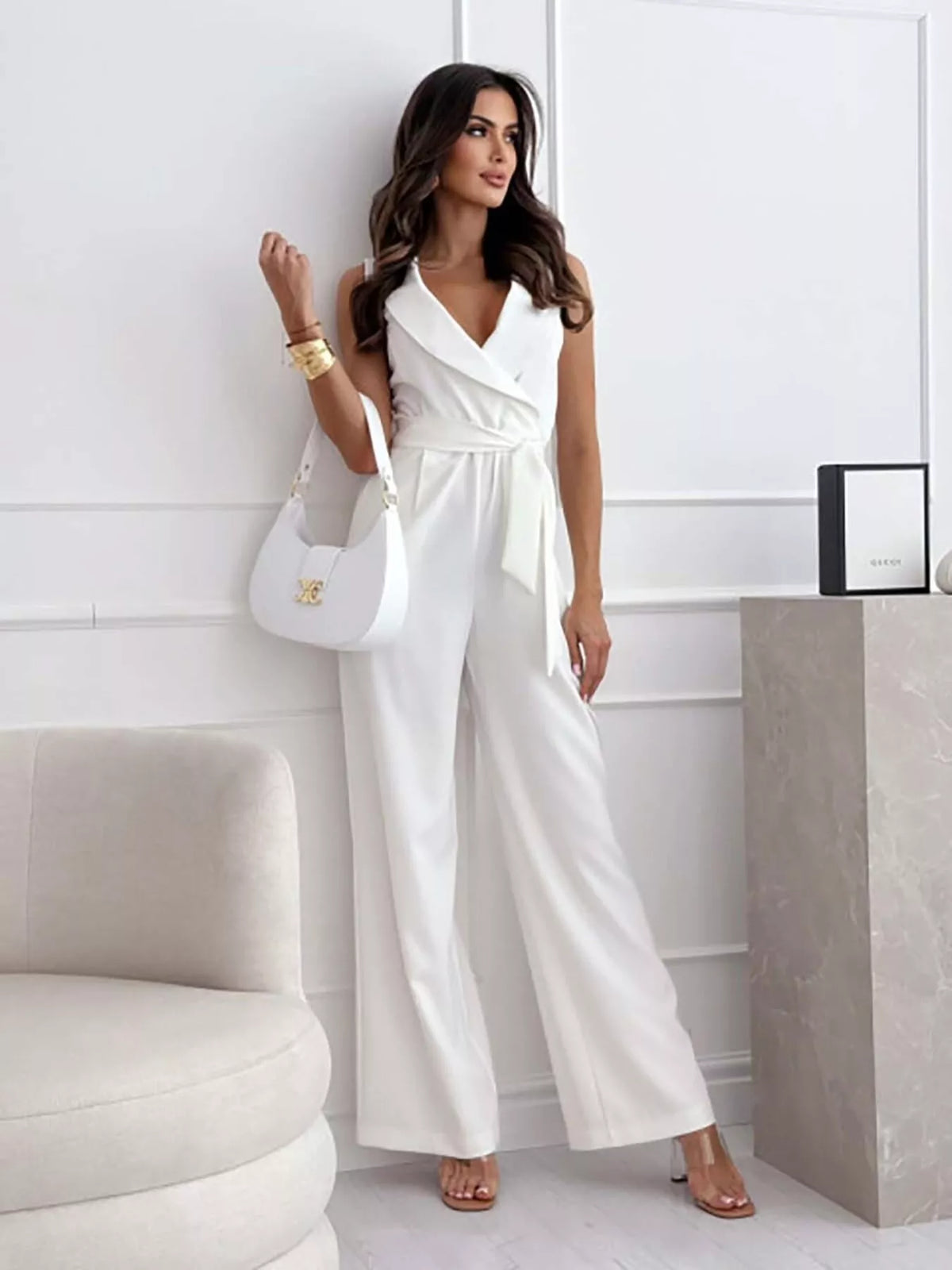 Seated view of the wide leg polyester jumpsuit
