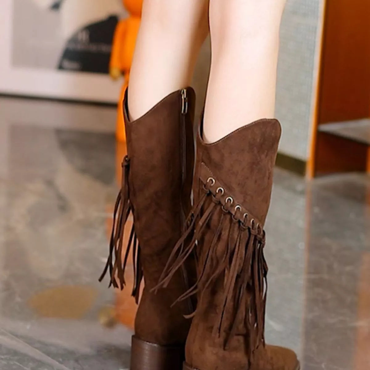 Fringed pointed toe block heel boots sole view