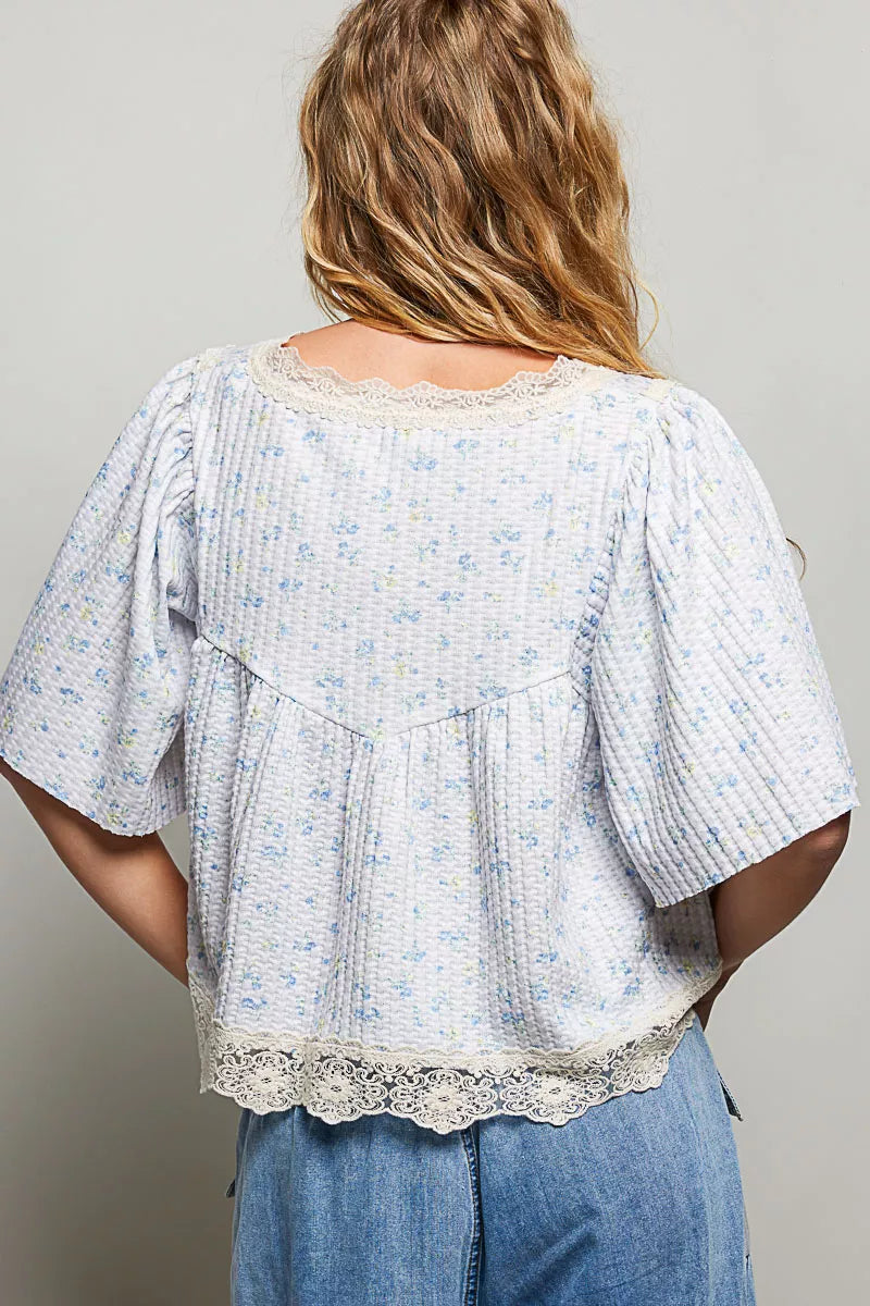Floral blouse neckline and shoulder detail