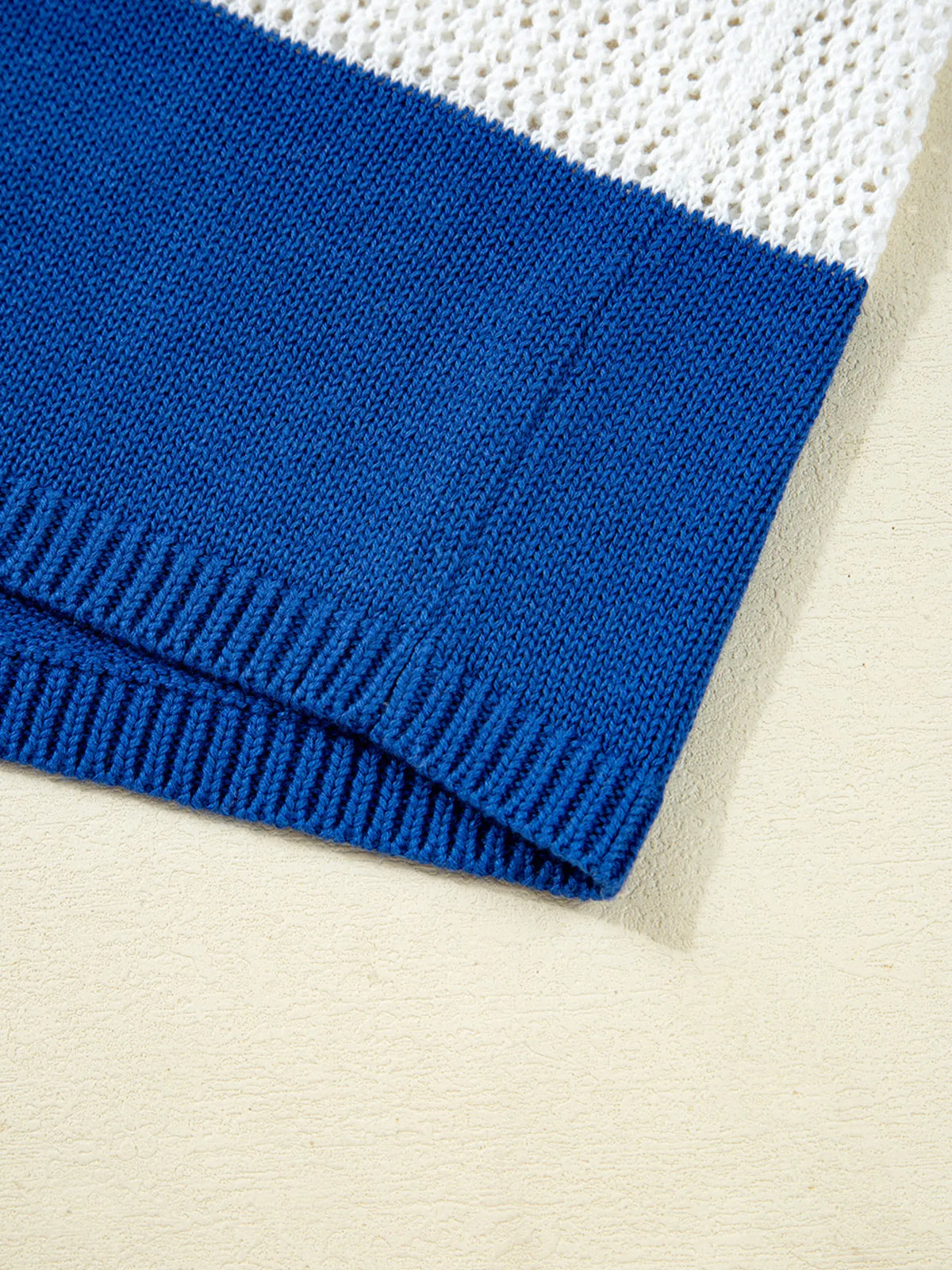 Dusty blue striped crochet polo cover up hem detail view