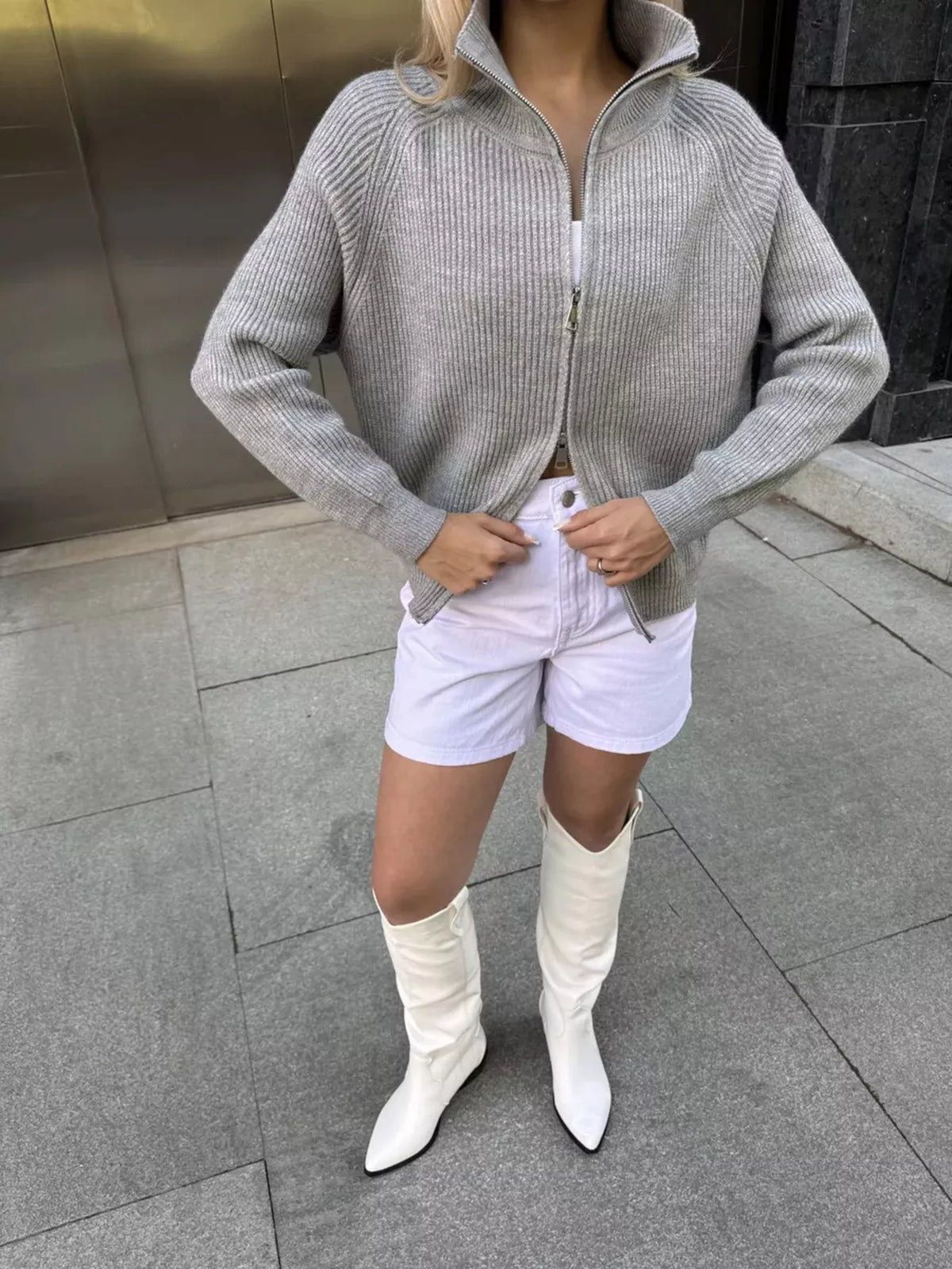 Ribbed zip up cardigan styled look