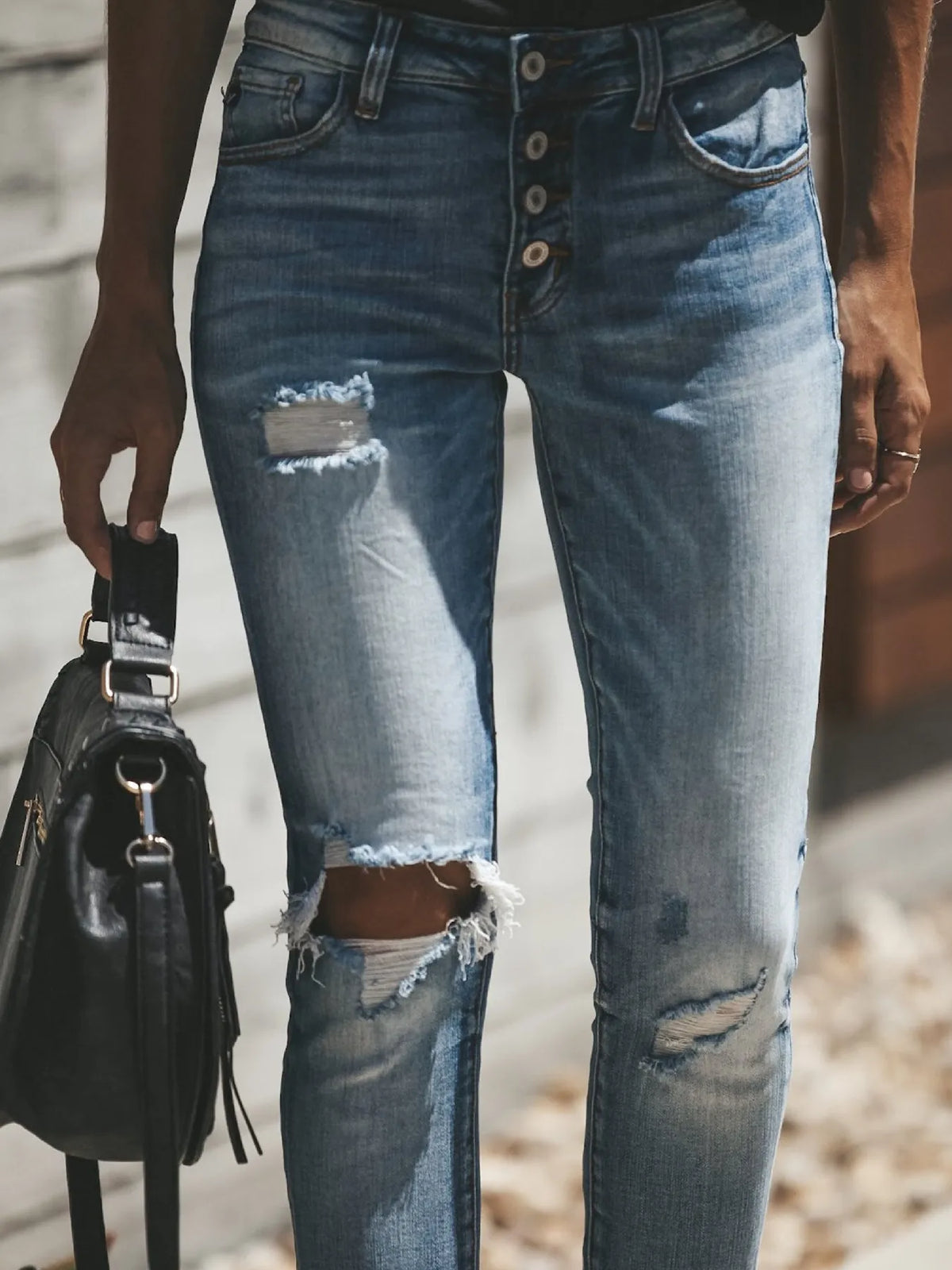 Back view of button fly skinny jeans