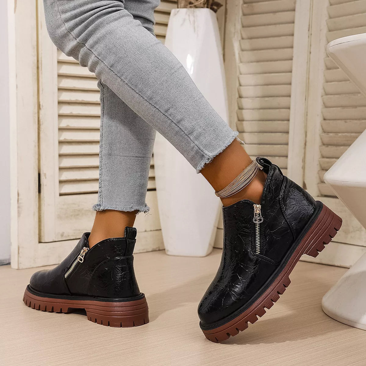black round toe block heel boots upper close up