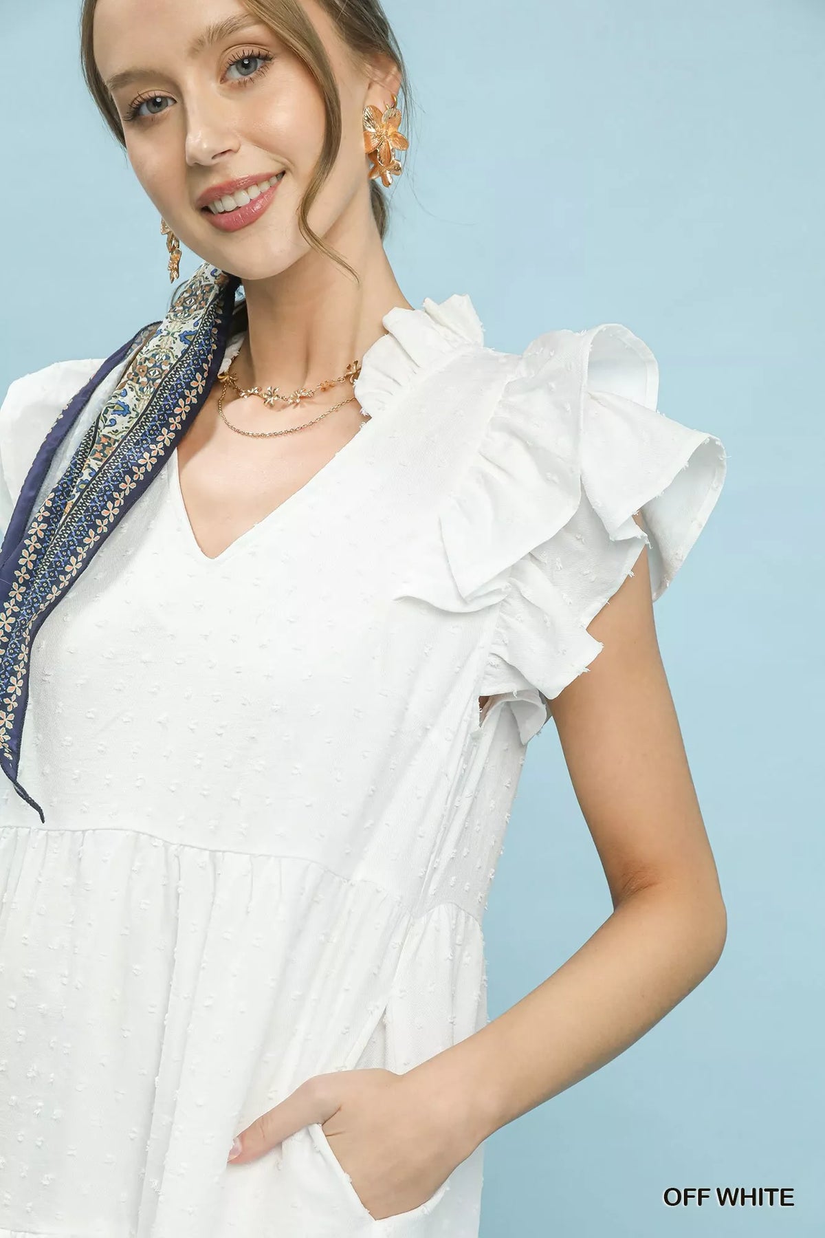 Side view of the textured tiered midi dress