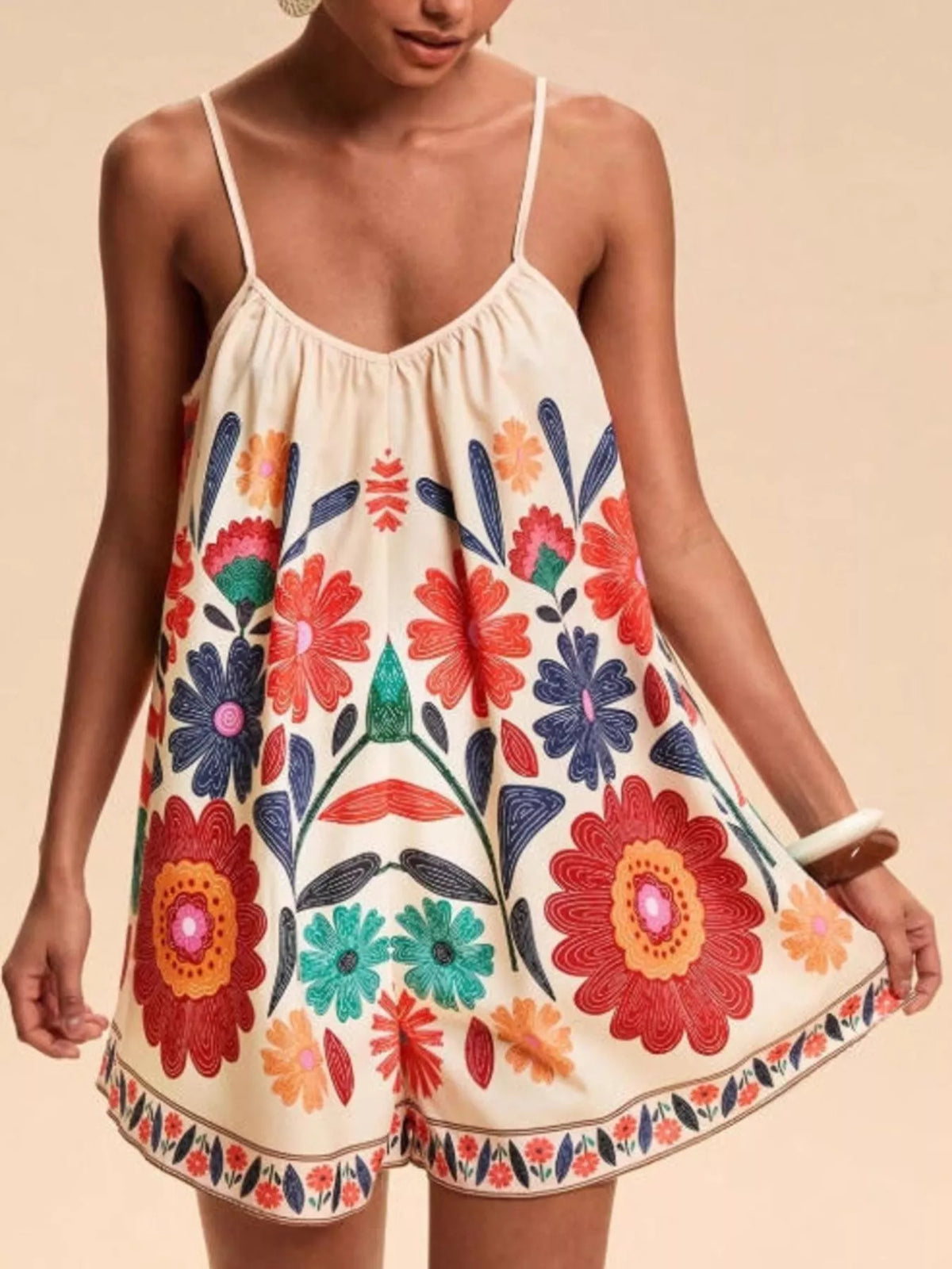 Red floral print spaghetti strap romper front view on model