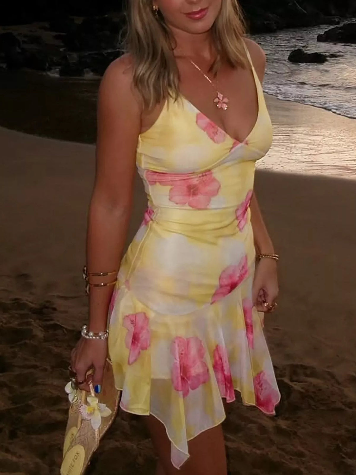 Sheer floral mini dress styled with heels